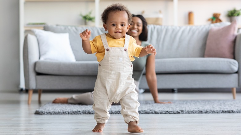 Baby in overalls