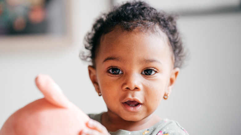 Baby looking surprised