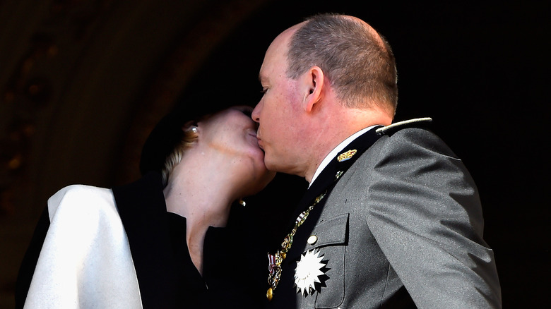 Princess Charlene and Prince Albert kiss