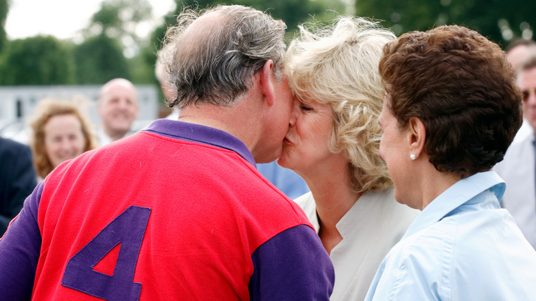 King Charles and Queen Camilla kissing in 2005