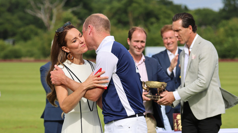 Prince William and Princess Catherine kiss 