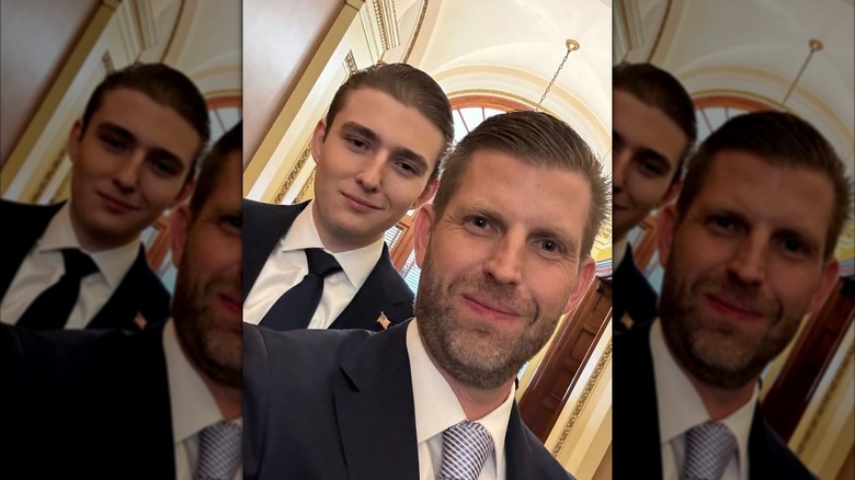 Barron Trump and Eric Trump smiling for a selfie