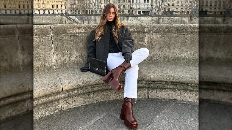 Woman wearing brown bold boots