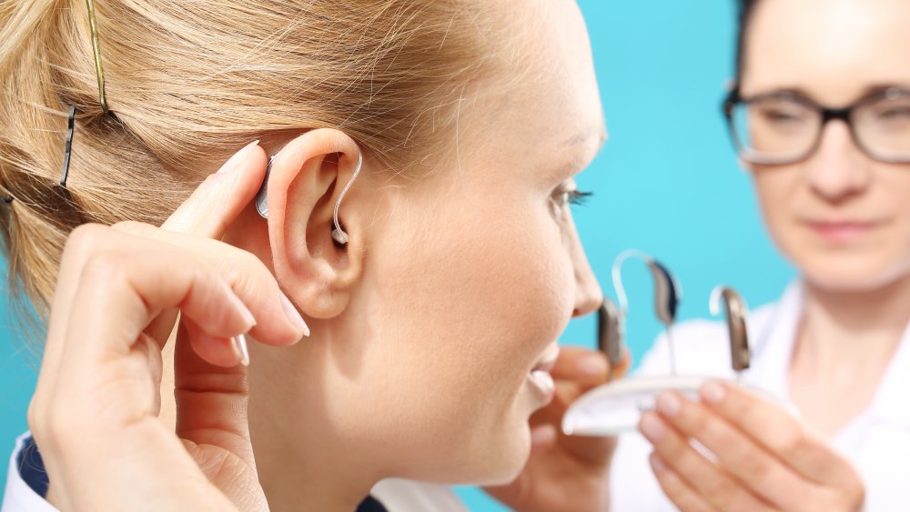 Woman getting fitted for hearing aids