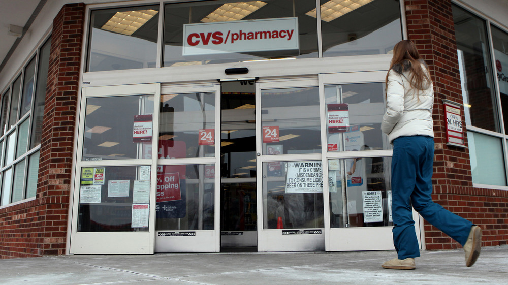 A woman entering a CVS store in 2014