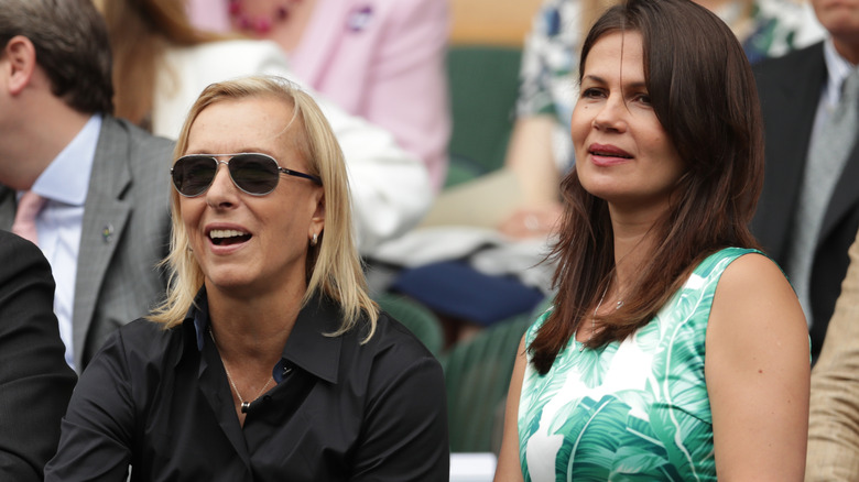 Martina Navratilova and Julia Lemigova in crowd