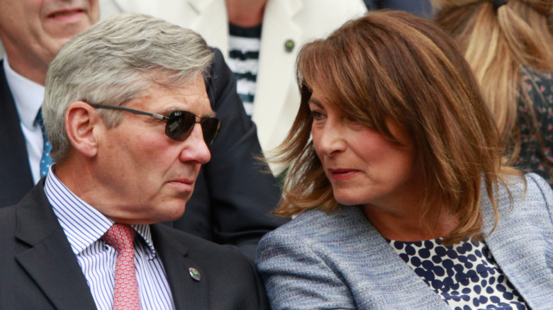 Carole middleton talking to Michael Middleton