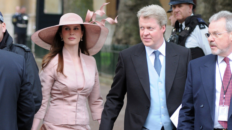 Charles Spencer and Karen Gordon holding hands 