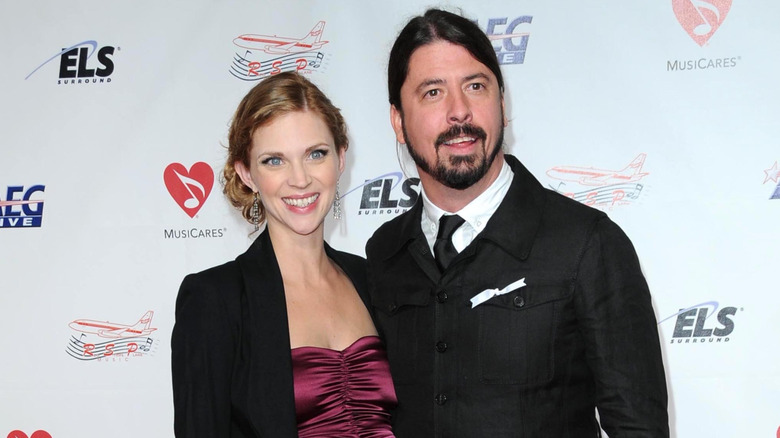 Jordyn Blum and Dave Grohl smile at 2009 Musicares Person of the Year Gala in Los Angeles (2009)