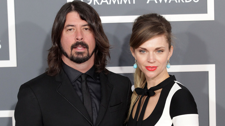 Dave Grohl and wife Jordyn Blum attend the 2013 Grammy Awards (2013)