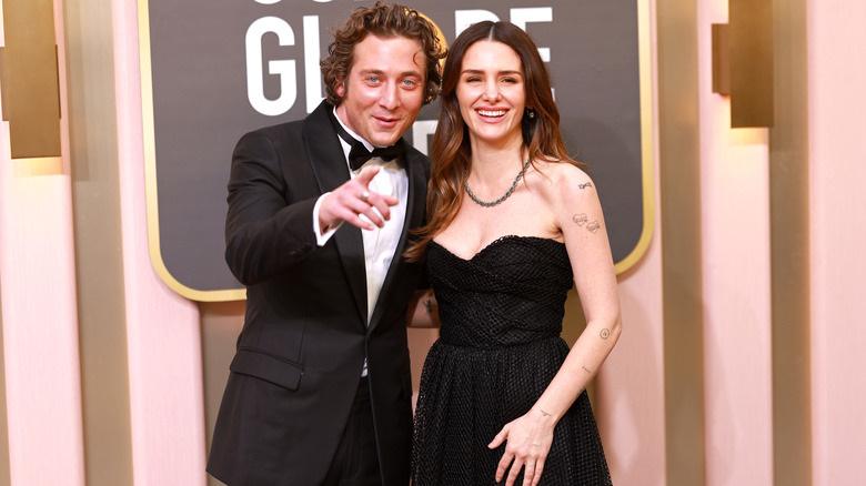 Jeremy Allen White and Addison Timlin joking on the red carpet