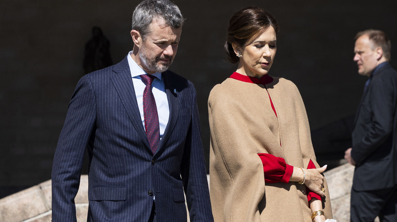 Queen Mary and King Frederik walking together