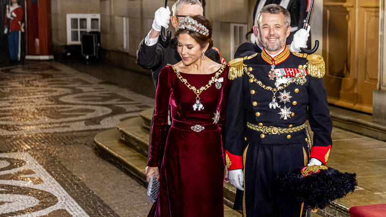 Queen Mary and King Frederik arriving at an event