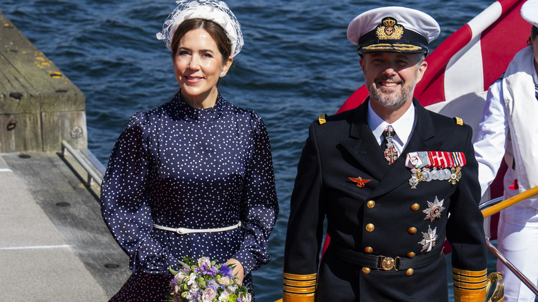 Queen Mary and King Frederik walking together