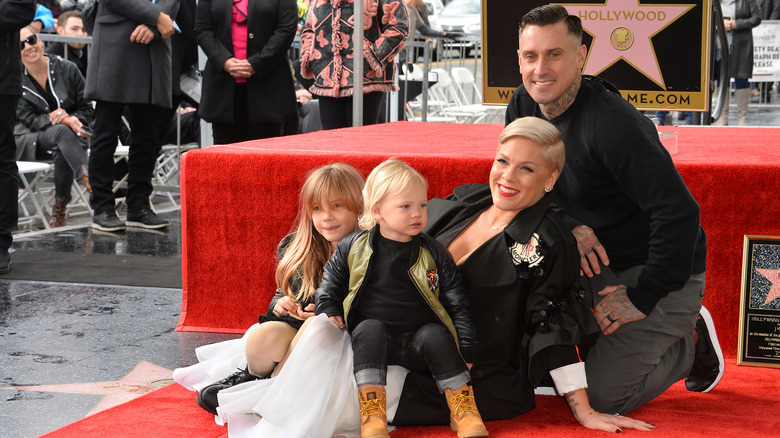 Pink and Carey Hart with kids on Hollywood Walk of Fame