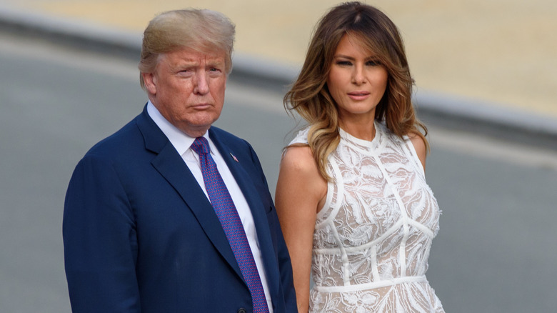 Donald and Melania Trump standing together