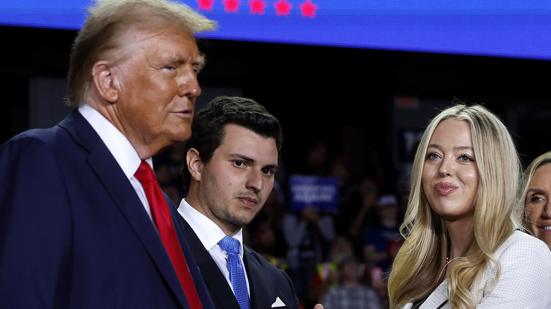 Donald Trump, Michael Boulos, and Tiffany Trump standing together