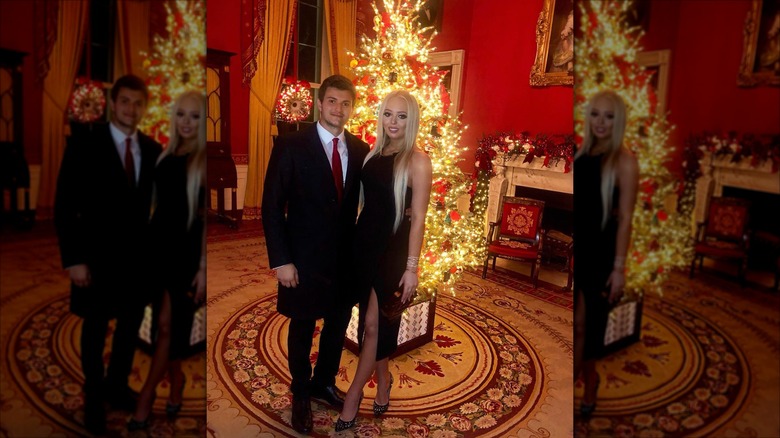 Michael Boulos and Tiffany Trump in front of a Christmas tree at the White House