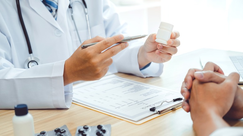 doctor recommending medication to patient