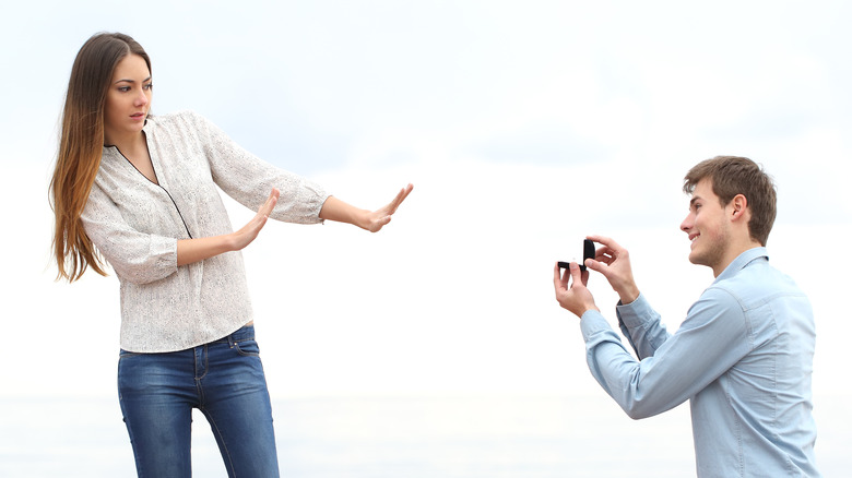 Woman rejecting wedding proposal