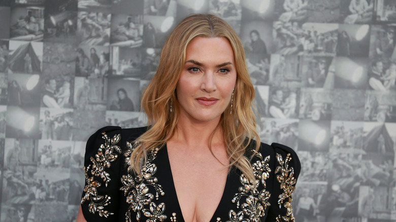 Kate Winslet poses in black gown