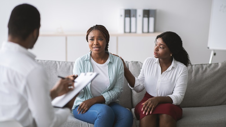 Couple talking to therapist