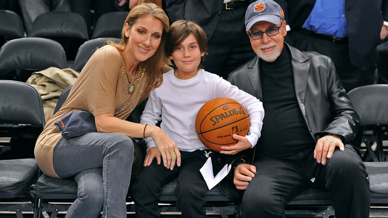 Celine Dion, René-Charles Angélil, and René Angélil smiling