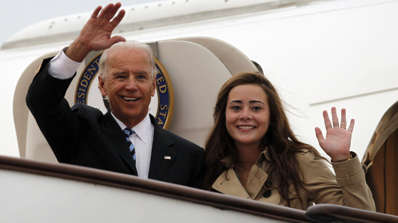 Joe and Naomi Biden waving