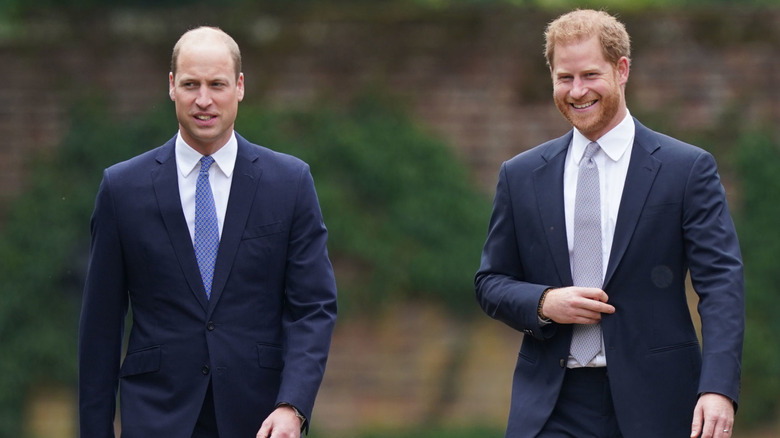 Prince William walking beside Prince Harry