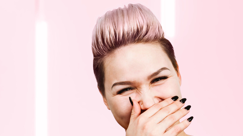 Woman with pink pompadour