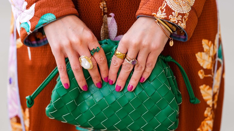 Woman wearing gold rings