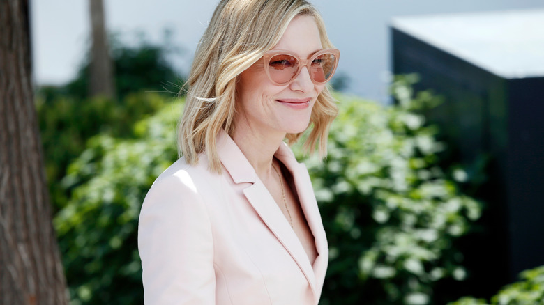 Cate Blanchette smiling in pale pink