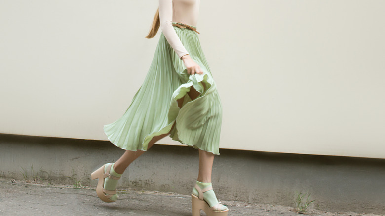 Girl walking with long skirt