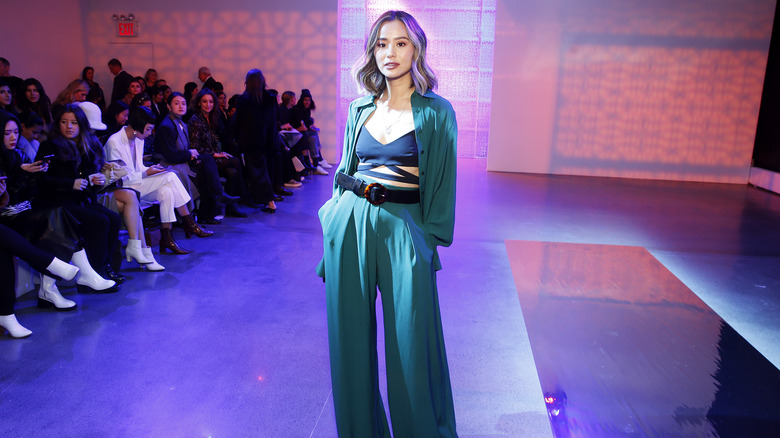 Jamie Chung modeling on the runway