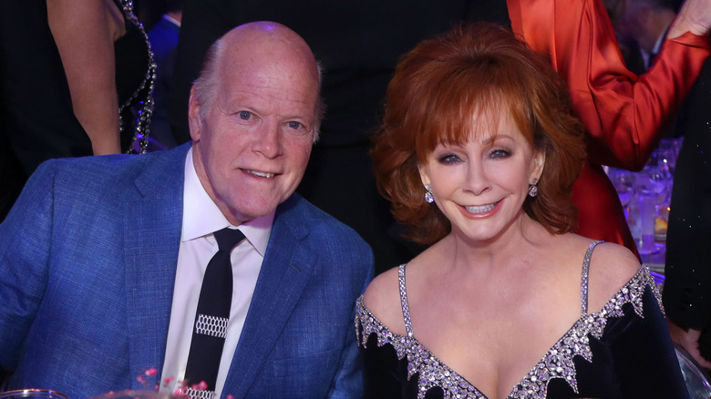 Rex Lin posing with Reba McEntire