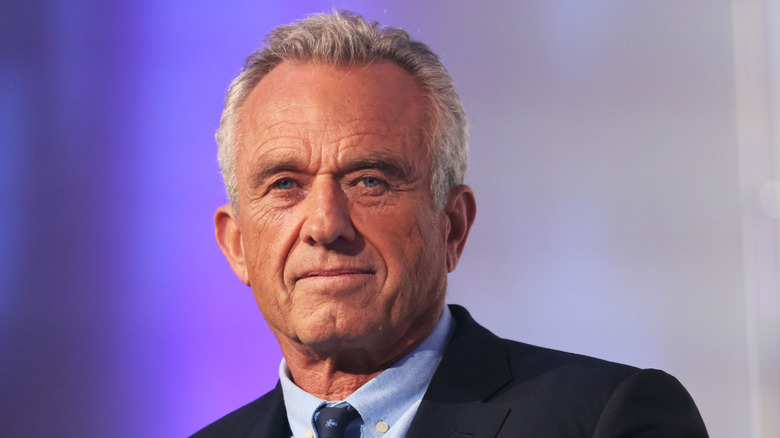 Robert F. Kennedy Jr. gives a tight-lipped smile for the camera