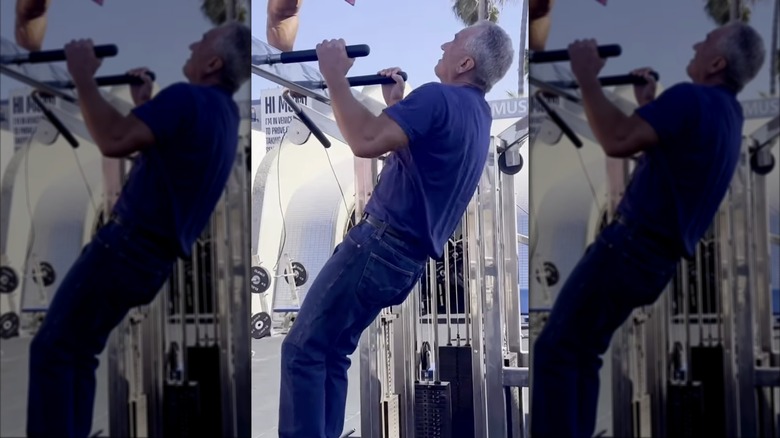 RFK Jr. doing pull-ups in jeans