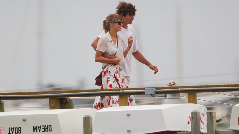 Conor Kennedy strolling on pier with Taylor Swift