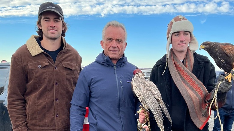 Aiden Kennedy, RFK, Finn Kennedy posing with falcon