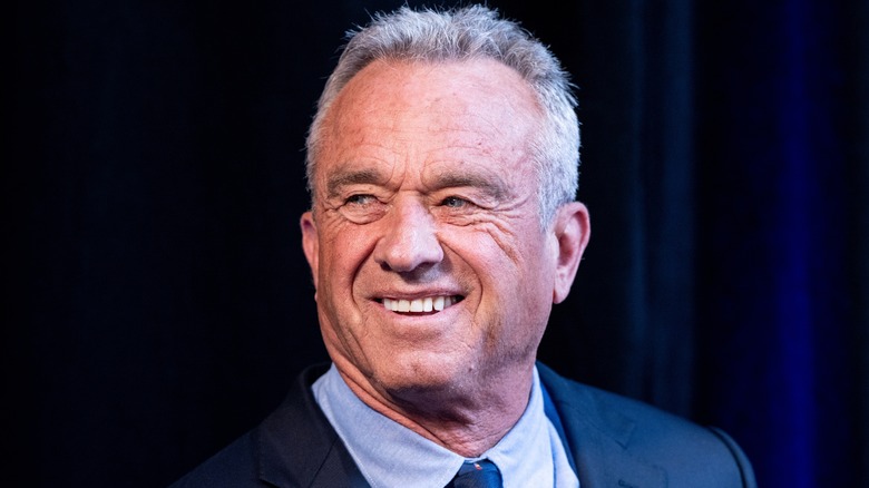 Robert F. Kennedy Jr. looking right and smiling