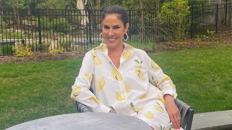 Jennifer Fessler lemon shirt, sitting outside