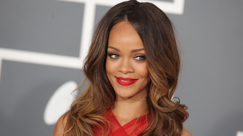 Rihanna smiling at an event