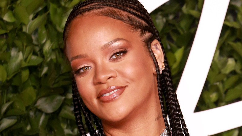 Rihanna smiling at an event