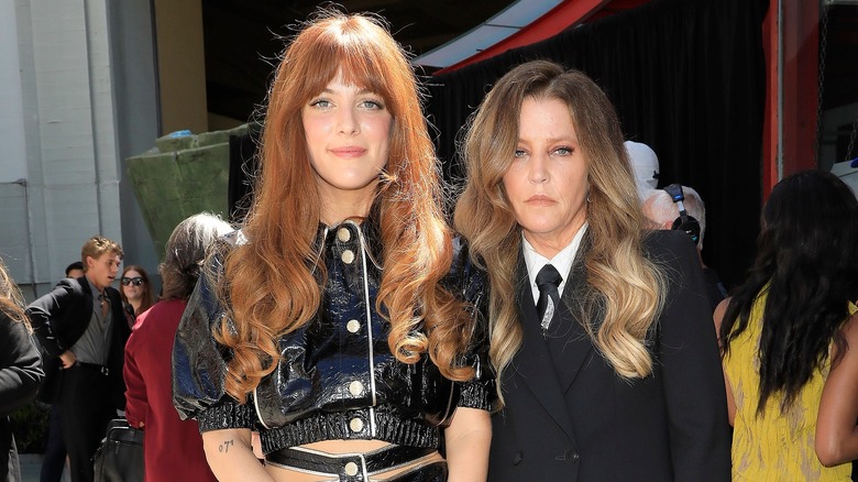 Riley Keough and Lisa Marie Presley posing