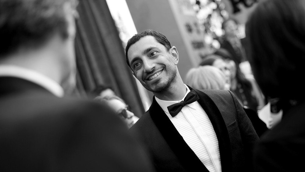 Actor Riz Ahmed smiles on the red carpet