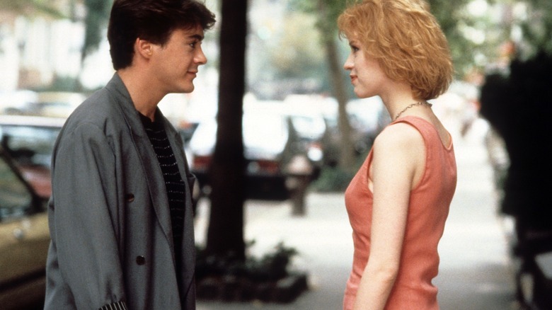 Robert Downey Jr. looking at Molly Ringwald