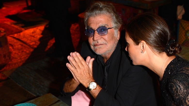 Roberto Cavalli hands together