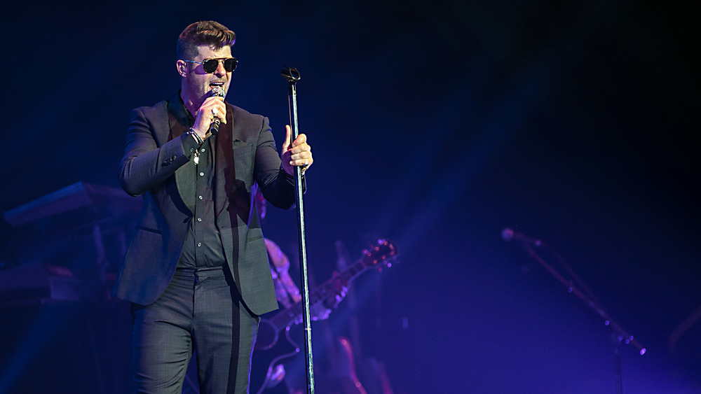 Robin Thicke performing on stage