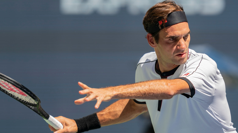 Roger Federer mid-swing in a match