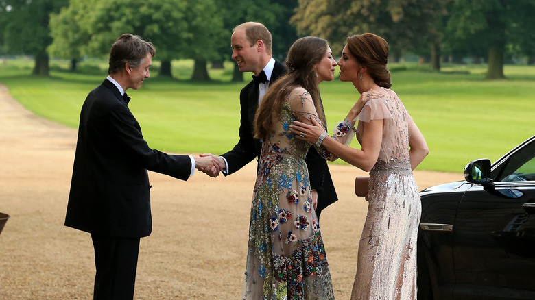 The Waleses and the Cholmondeleys at an event 